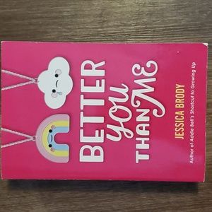 "Better You Than Me" paper back book by Jessica Brody.  Ages10 and up